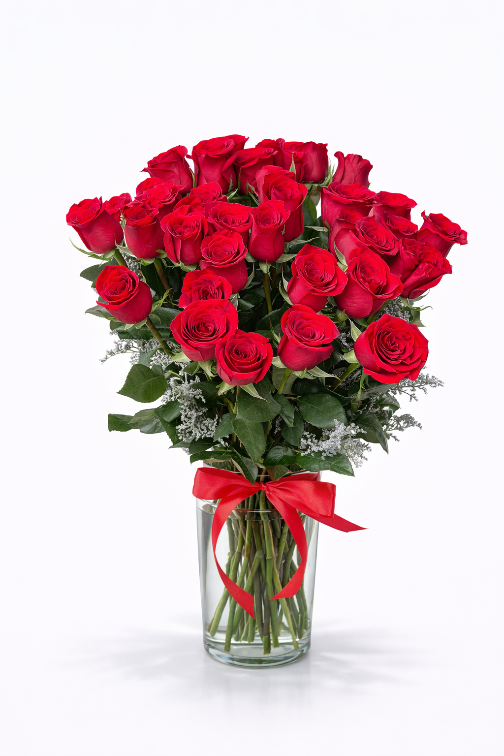 Florero de rosas rojas